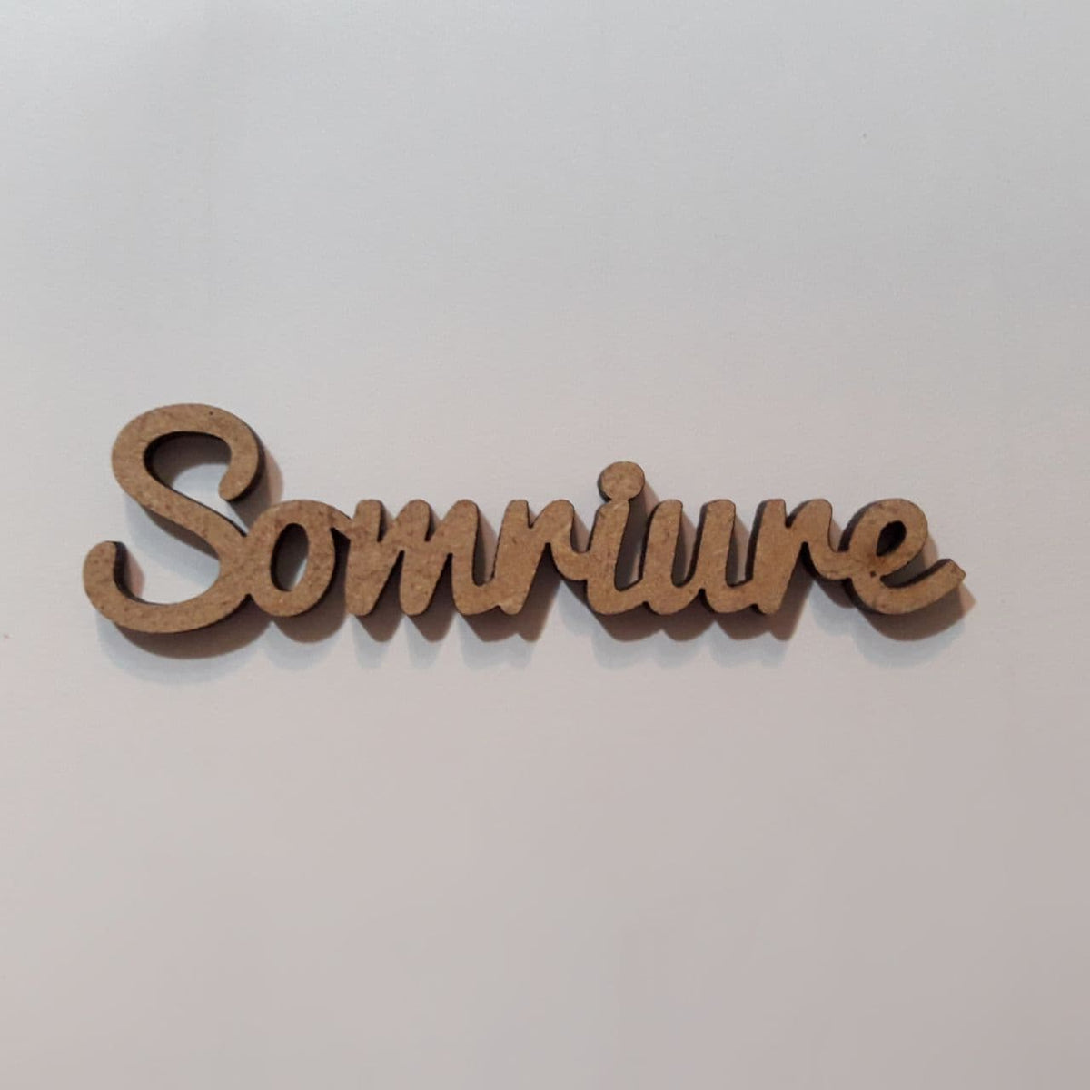 Maderita palabra Somriure